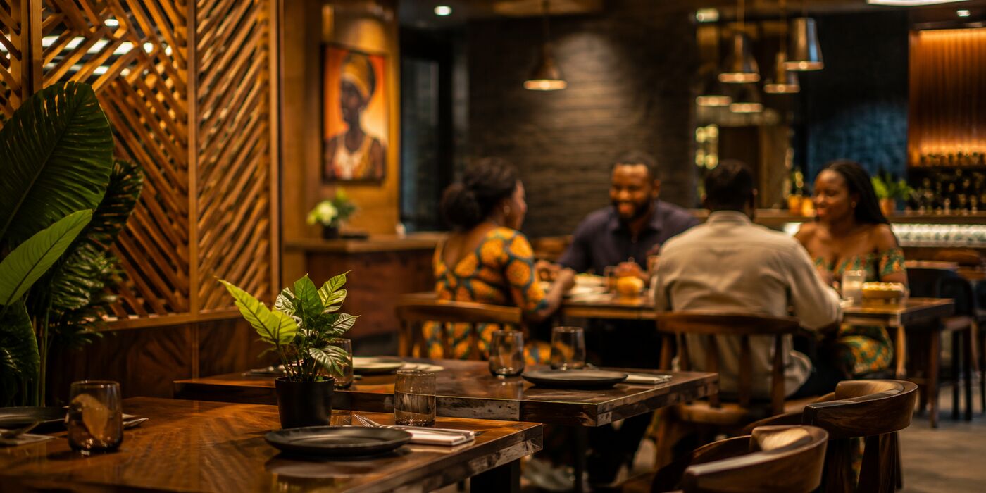 Interior of a modern, cozy Nigerian restaurant dining area